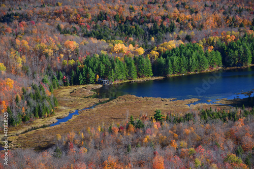 Orford National Park SEPAQ, Fer-de-Lance pond during fall season, autumn contrasting colors