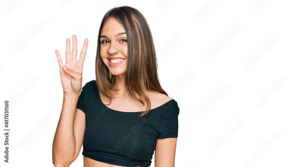 Young brunette woman wearing casual clothes showing and pointing up with fingers number four while smiling confident and happy. Young brunette woman wearing casual clothes showing and pointing up with fingers number four while smiling confident and happy.