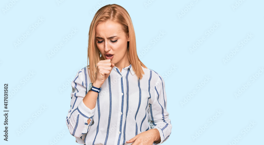 Beautiful caucasian woman wearing casual clothes feeling unwell and coughing as symptom for cold or bronchitis. health care concept. Beautiful caucasian woman wearing casual clothes feeling unwell and coughing as symptom for cold or bronchitis. health care concept.
