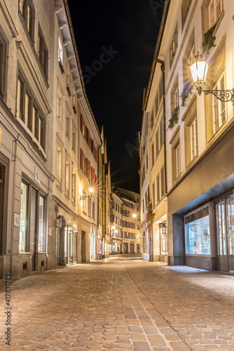 Historical street of the old town in Chur, Switzerland at night © Taljat