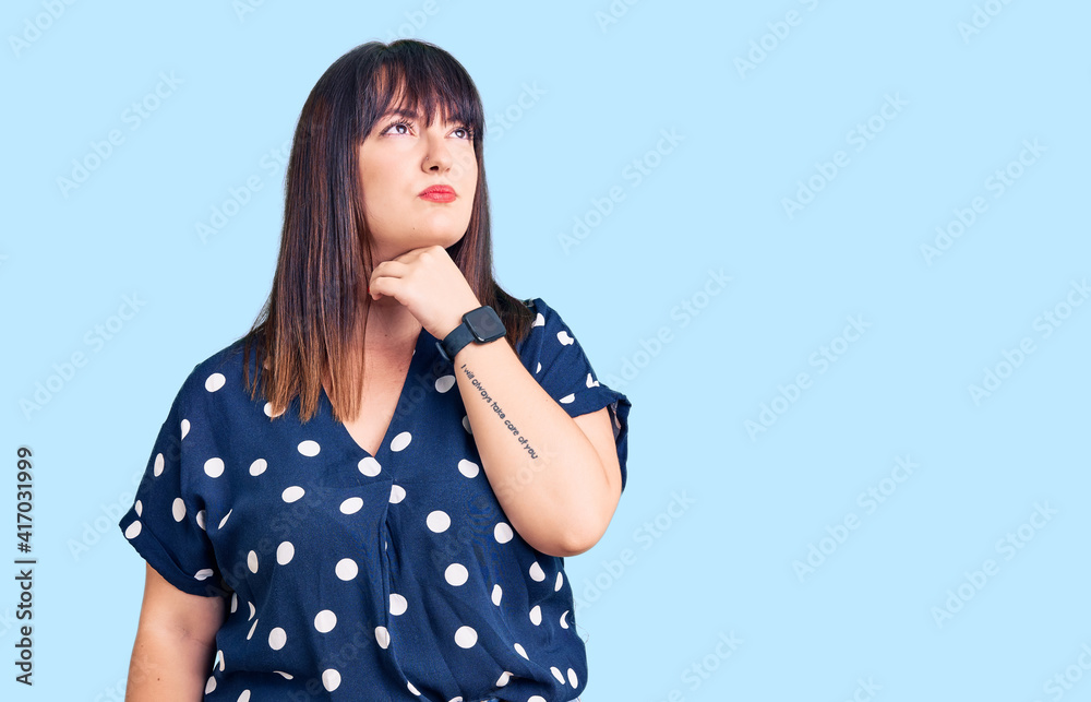 Young plus size woman wearing casual clothes touching painful neck, sore throat for flu, clod and infection Young plus size woman wearing casual clothes touching painful neck, sore throat for flu, clod and infection