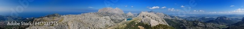 Spectacular Panorama View From The Summit Of Mount L'Ofre To The Puig Major And Lake Cuber In The Tramuntana Mountains On Balearic Island Mallorca On A Sunny Winter Day With A Clear Blue Sky