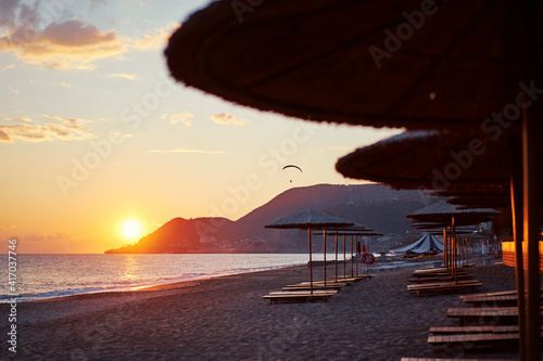 Beautiful landscape. Traveling by Turkey. Sea Beach with sunloungers and umbrellas.