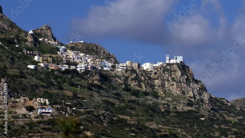 Karpathos Greece Menetes  a time-lapse with clouds above the village on winder photo