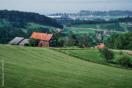 Alpine mountains landscape. Traditional farm house with wonderfull view.