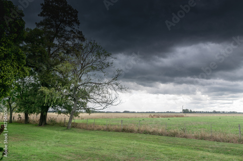 Rural landscape with a stormy sky