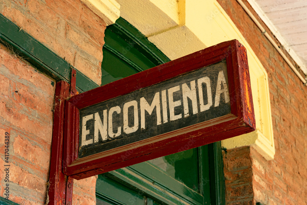 Old sign in an abandoned train station that says: Old sign in an abandoned train station that says: