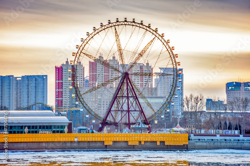 Ferris wheel of the chinese city of heihe by the amur river