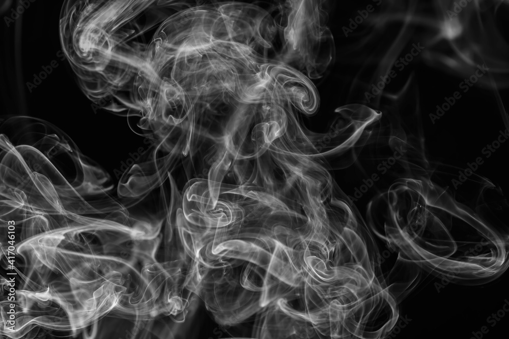 Isolated white smoke overlay effect on solid super black background. Isolated white smoke overlay effect on solid super black background.