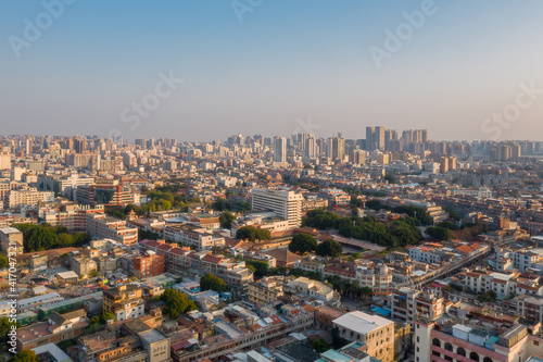 Aerial view of old city and modern city skyline in Quanzhou at dusk © Sen