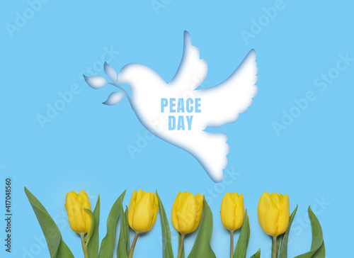Dove and tulip flowers on c...