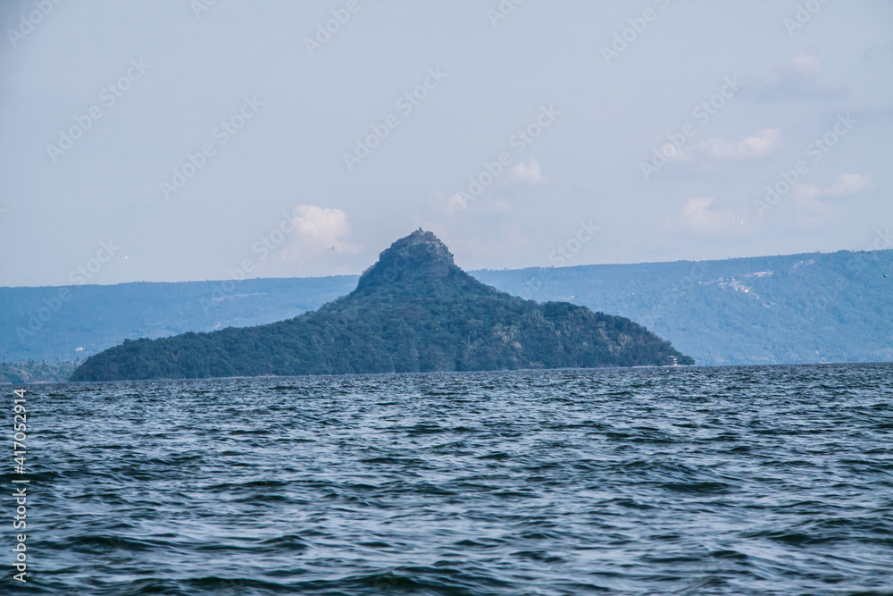 dramatic photos of the worlds smallest volcano. The Taal volcano in the Philippines before its eruption in 2020.