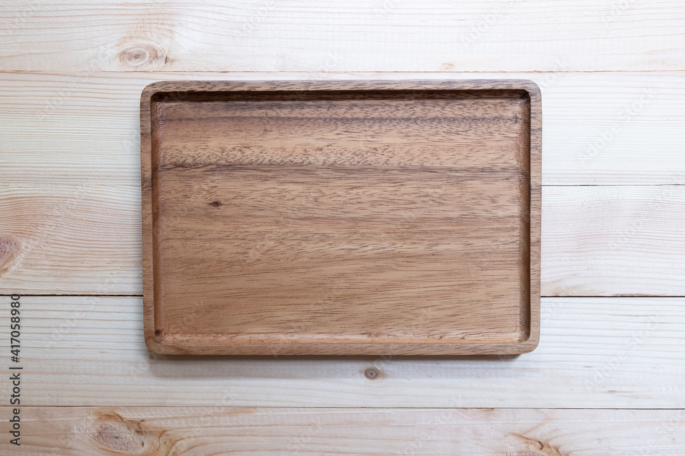 Empty wooden tray, cutting board.Table background. Top view. Empty wooden tray, cutting board.Table background. Top view.