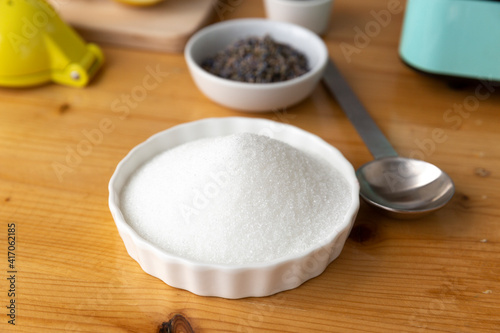 Sugar in white bowl for cooking