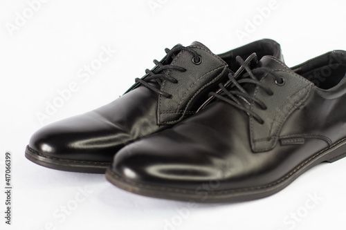 black classic men's shoes on a white background
