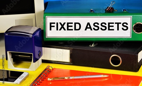 Fixed assets. Text label on the folder. Material objects that are used for a long time by the organization in the process of managing production, performing work, and providing services.