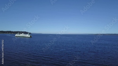 Aerial view of the Seattle Ferry following the route across Puget Sound between Seattle and Bainbridge Island, Washington.  photo