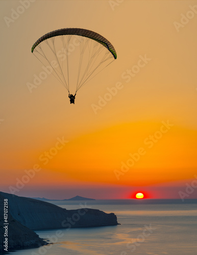 paraglider pilot fly in sky on beauty nature mountain and sea landscape