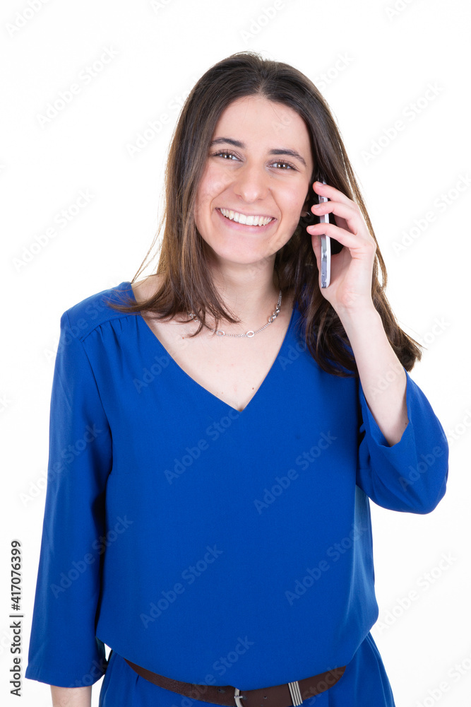 Portrait of happy young girl talking phone in hand on white background Portrait of happy young girl talking phone in hand on white background