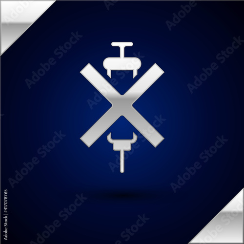 Silver No doping syringe icon isolated on dark blue background. Vector.