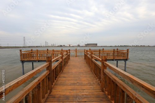 The wooden trestle extends to the sea, North China © zhang yongxin