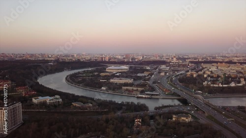 sunset evening moscow cityscape river famous luzhniki stadium complex aerial panorama 4k russia