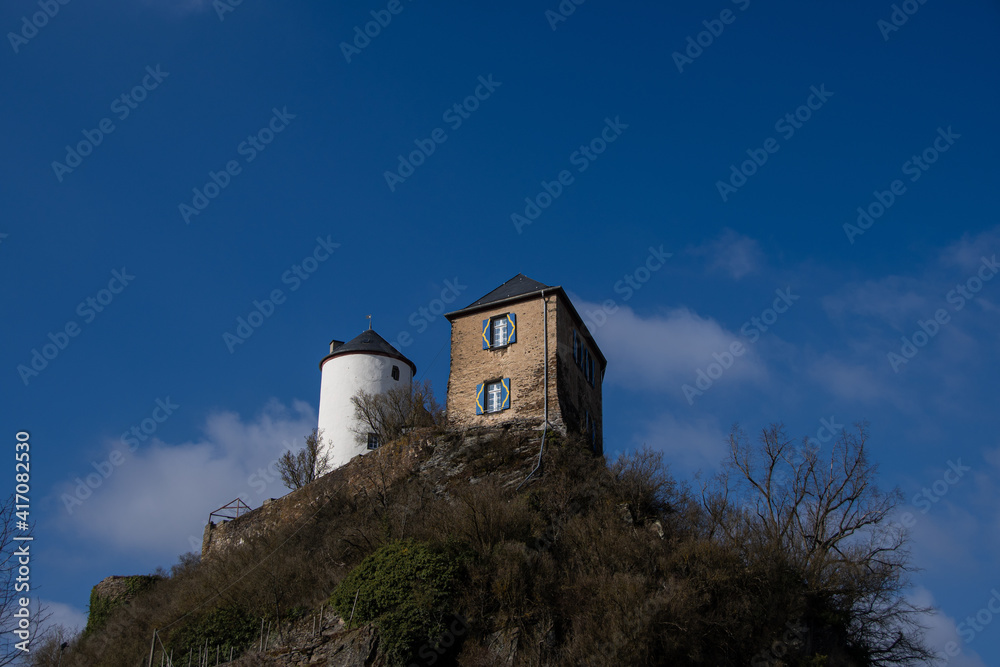 The medieval castle Kreuzberg and a blue sky with clouds