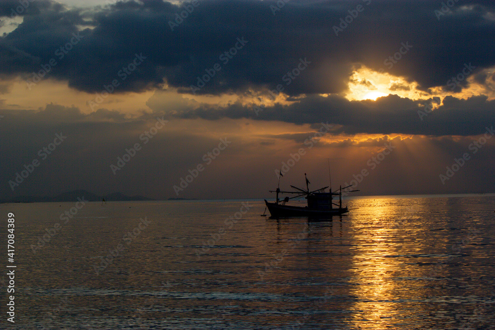 boat in the sunset ,Fishing boats at sunset, Bang Lamung, Chon Buri, Thailand