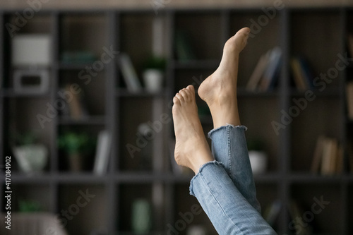 Obraz na plátne Crop close up of young Caucasian woman legs up in air, show new fresh pedicure or foot salon procedure or treatment