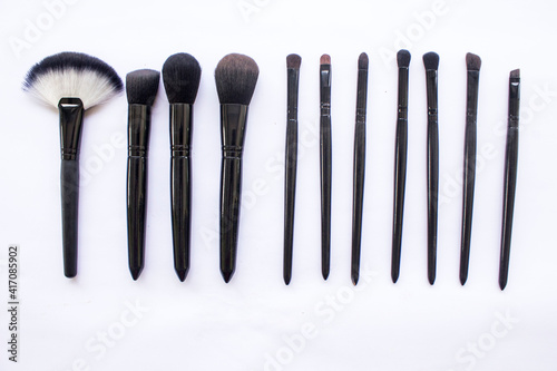 makeup brushes set isolated on white background. Top view  flat lay