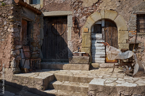 country stone house with peasant tools in a typical Sicilian village