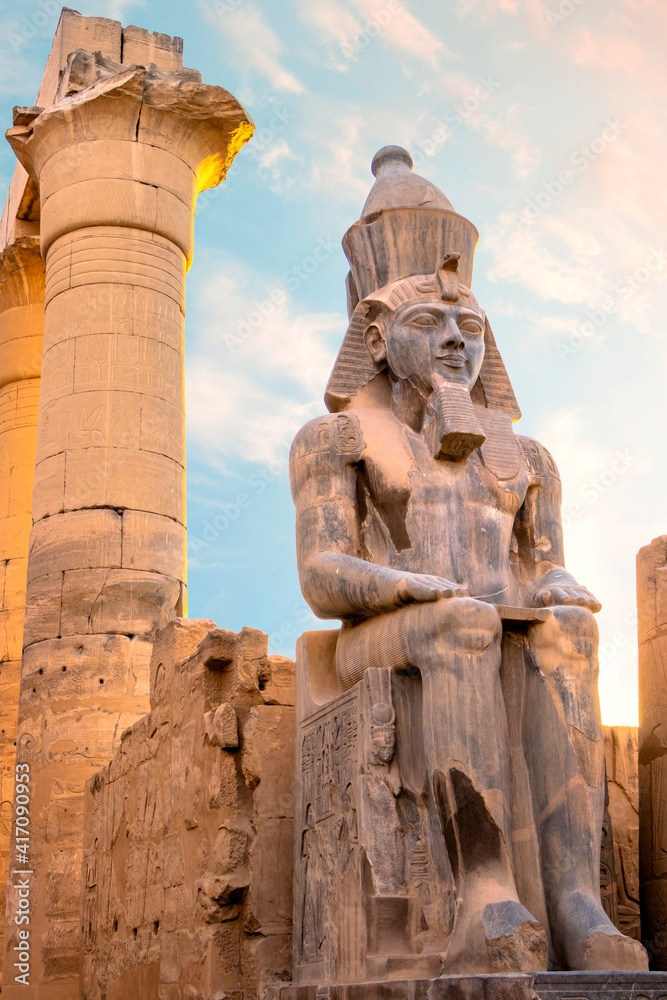 Ramesses ii statues. Statues at the Temple of Amun-Ra at Luxor. Egypt. ramesses II ,Luxor ,EGYPT, Egypt Luxor Temple. granite Statue of Ramesses II seated in front of columns