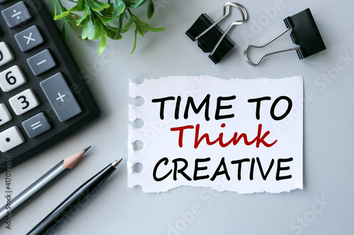 Time To Think Creative. text on white paper on gray background