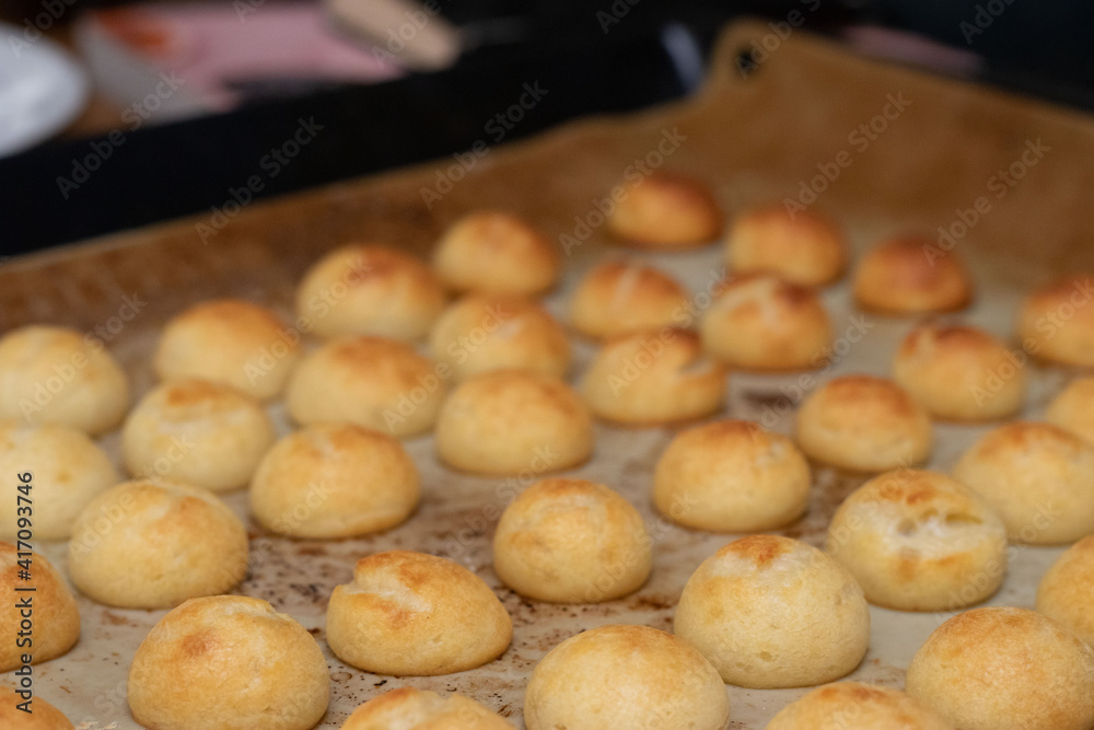 Pao de queijo, a brazilian mini cheese bread finger food, party food and snack Pao de queijo, a brazilian mini cheese bread finger food, party food and snack