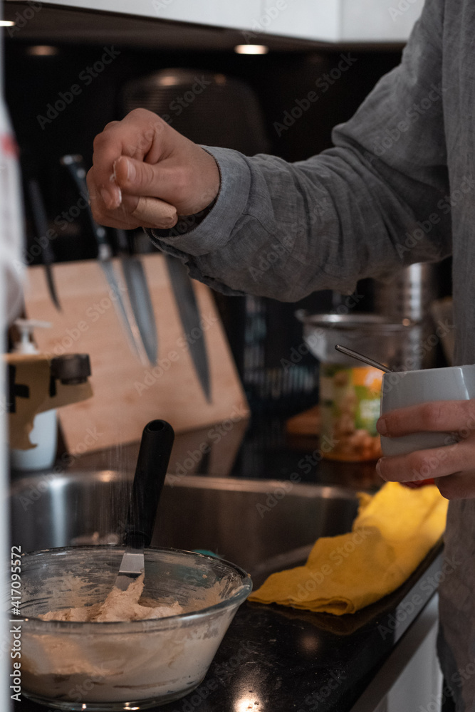 Cooking at home, preparing food
