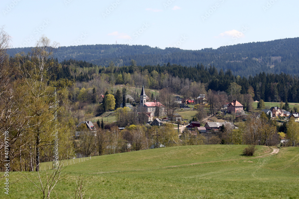 spring landscape with village and church