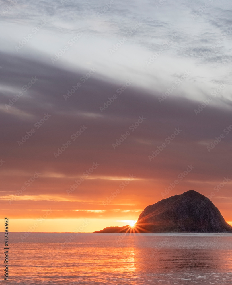 Sunset in the north sea. Landscape in the style of minimalism. paradise beach Haukland Lofoten Islands in polar Norway.