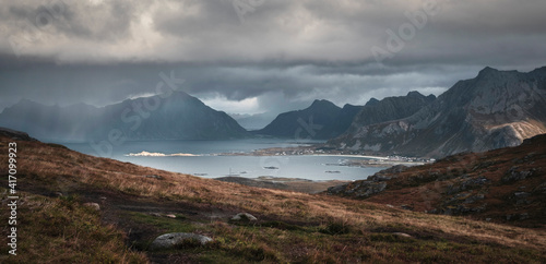 Canvas Print Heavy rain and sun over mountains and sea at Lofoten Islands in autumn Norway
