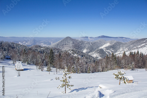 Beautiful winter landscape from the Serbian mountain Tara. View of the snow-capped distant hills. © Dragan