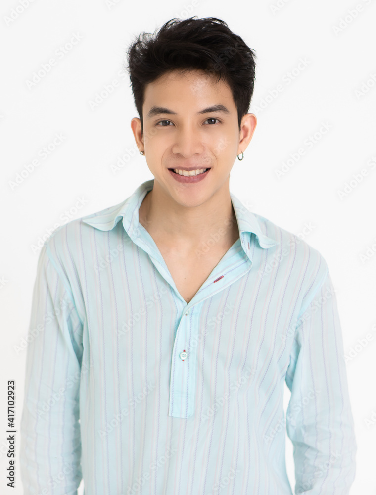 Young and handsome teenage black hair Asian man wearing earrings on white background Young and handsome teenage black hair Asian man wearing earrings on white background