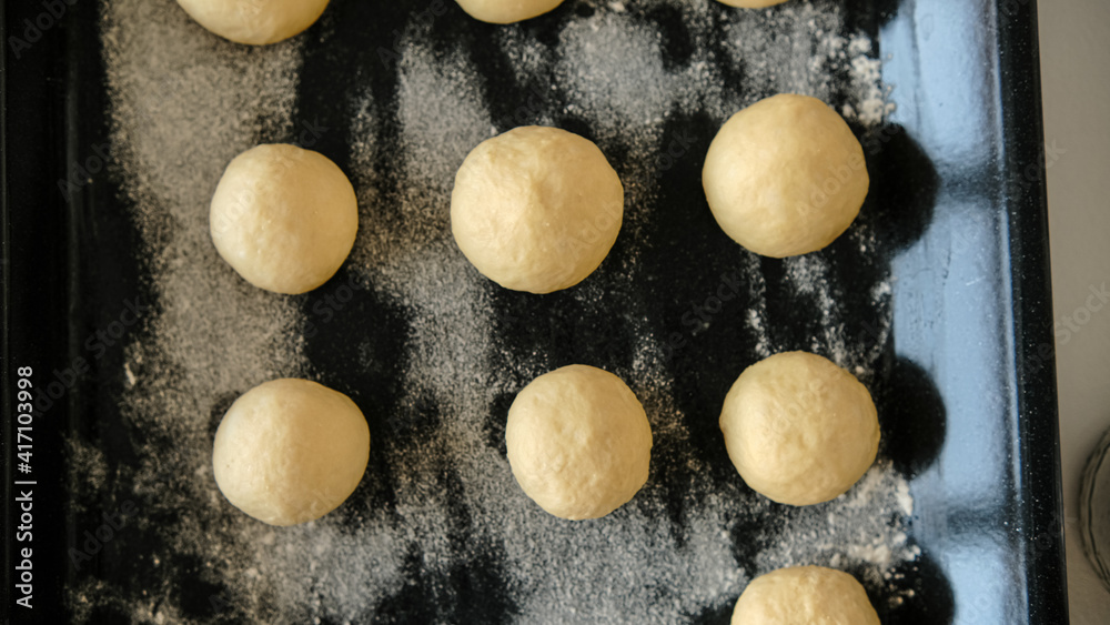 Close-up of raw dough for buns, cakes. On the wick. Flour products. Gluten free Close-up of raw dough for buns, cakes. On the wick. Flour products. Gluten free
