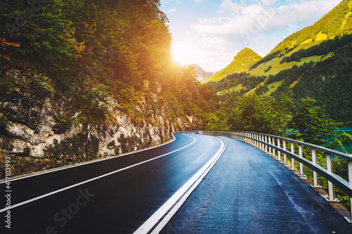 Beautiful mountain road  amazing view of alpine valley. Location place Swiss Alps  Switzerland  Europe.