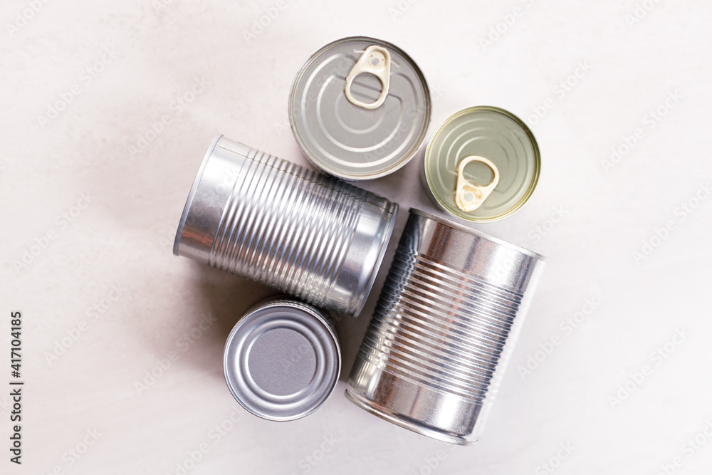 Various canned vegetables on kitchen table background. Various canned vegetables on kitchen table background.