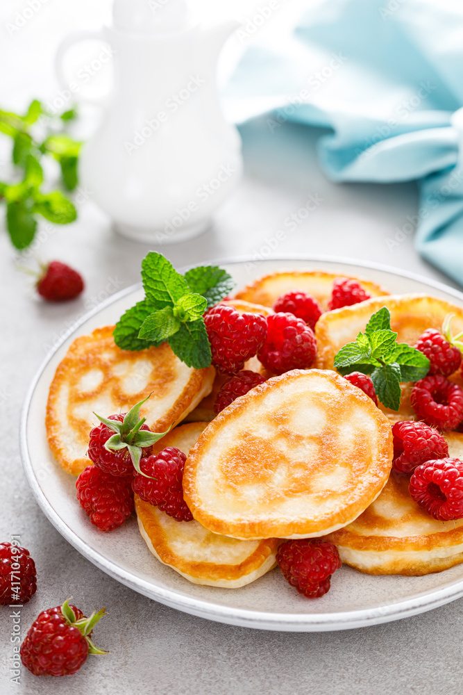 Pancakes with fresh raspberry and mint Pancakes with fresh raspberry and mint