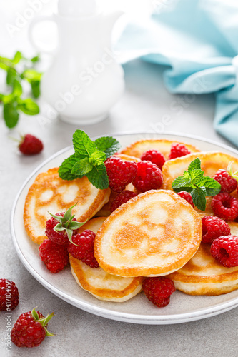 Pancakes with fresh raspberry and mint