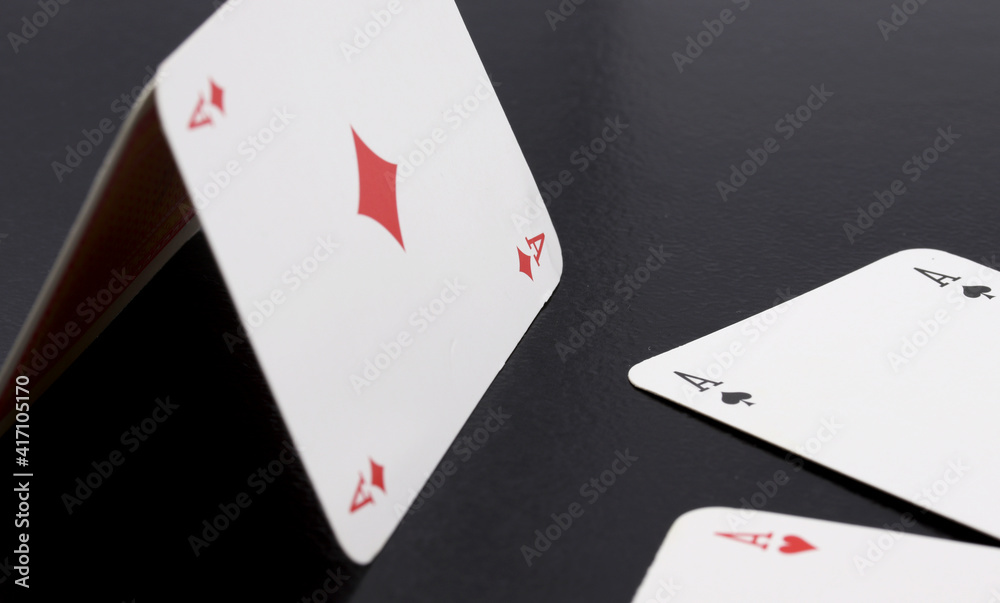 Obraz premium playing cards on a black background