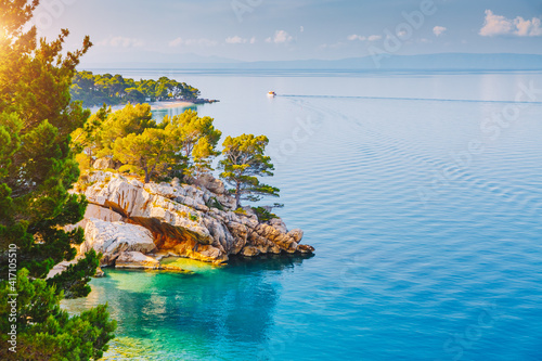 Fototapeta Naklejka Na Ścianę i Meble -  Cozy and wild beach with azure water in luxurious lagoon. Location place Croatia, Dalmatia region, Balkans, Europe.
