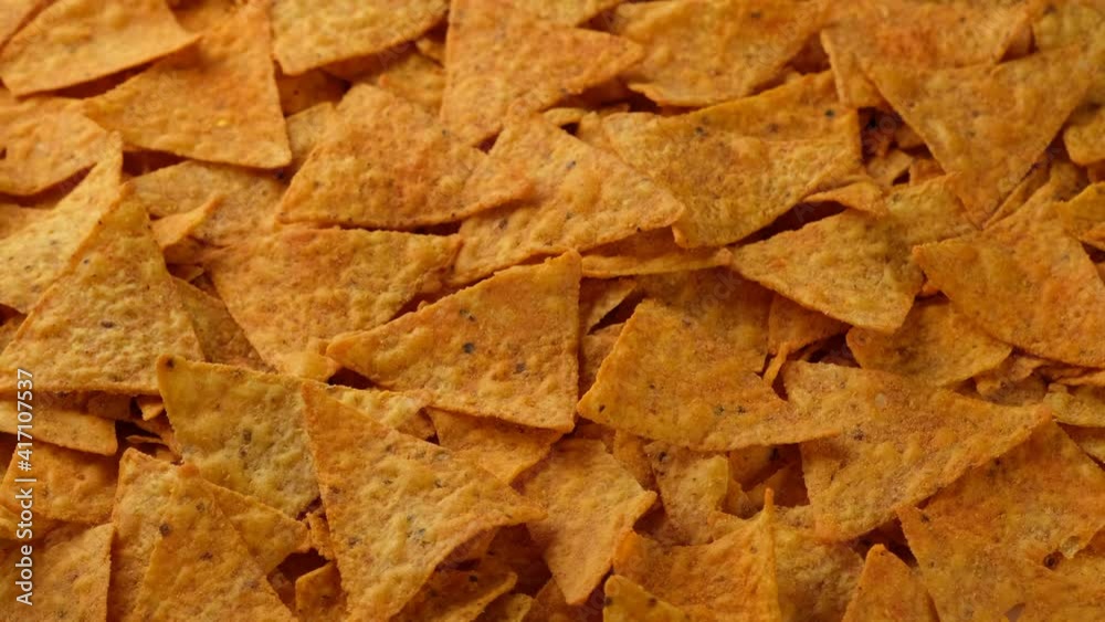Tortilla Chips close up rotation. Snack Tortilla Chips Tortilla Chips close up rotation. Snack Tortilla Chips