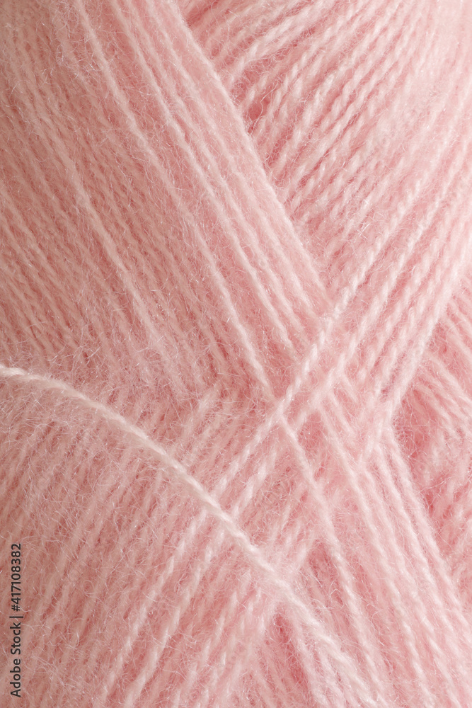 Fototapeta premium soft pastel pink yarn close up