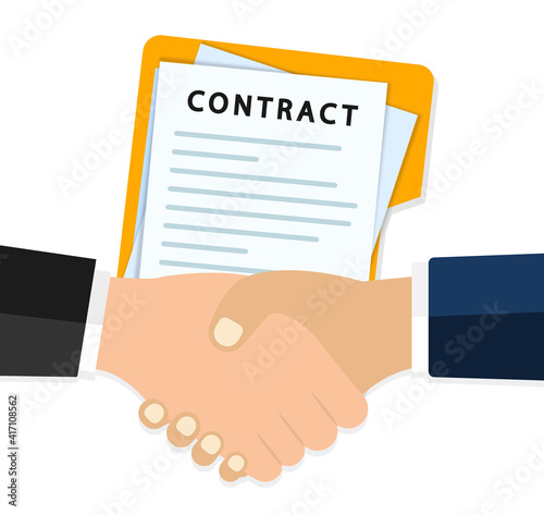 Handshake of business people on the background of the contract. Two businessmen shake hands after signing agreements. Сoncluding contract with handshake. Two hands doing handshake, business concept.